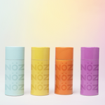 Load image into Gallery viewer, Light blue, yellow, orange, purple sunscreen sticks lined together 
